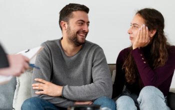 close-up-smiley-couple-therapy_23-2149220286