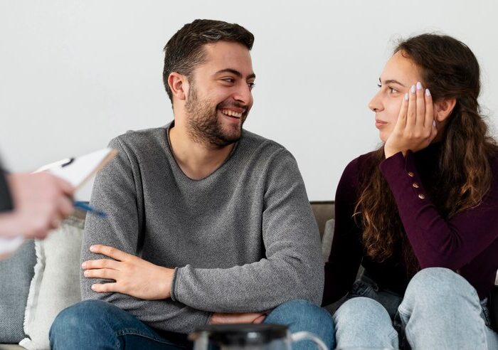 close-up-smiley-couple-therapy_23-2149220286